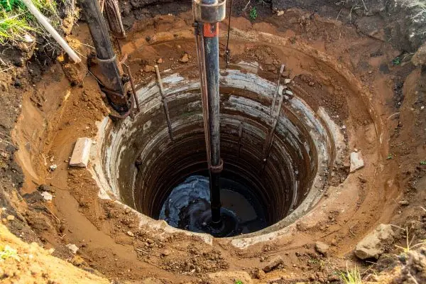 Looking down inside a drilled water well